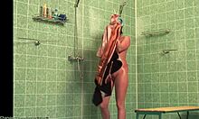 Slim amateur shows her wet naked body in the showers (HD voyeur)